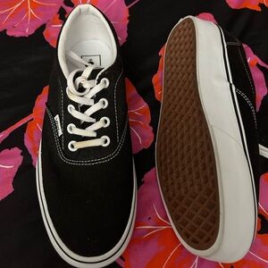 New Vans, size 6.5 men or 8 women. Never worn. No packaging.